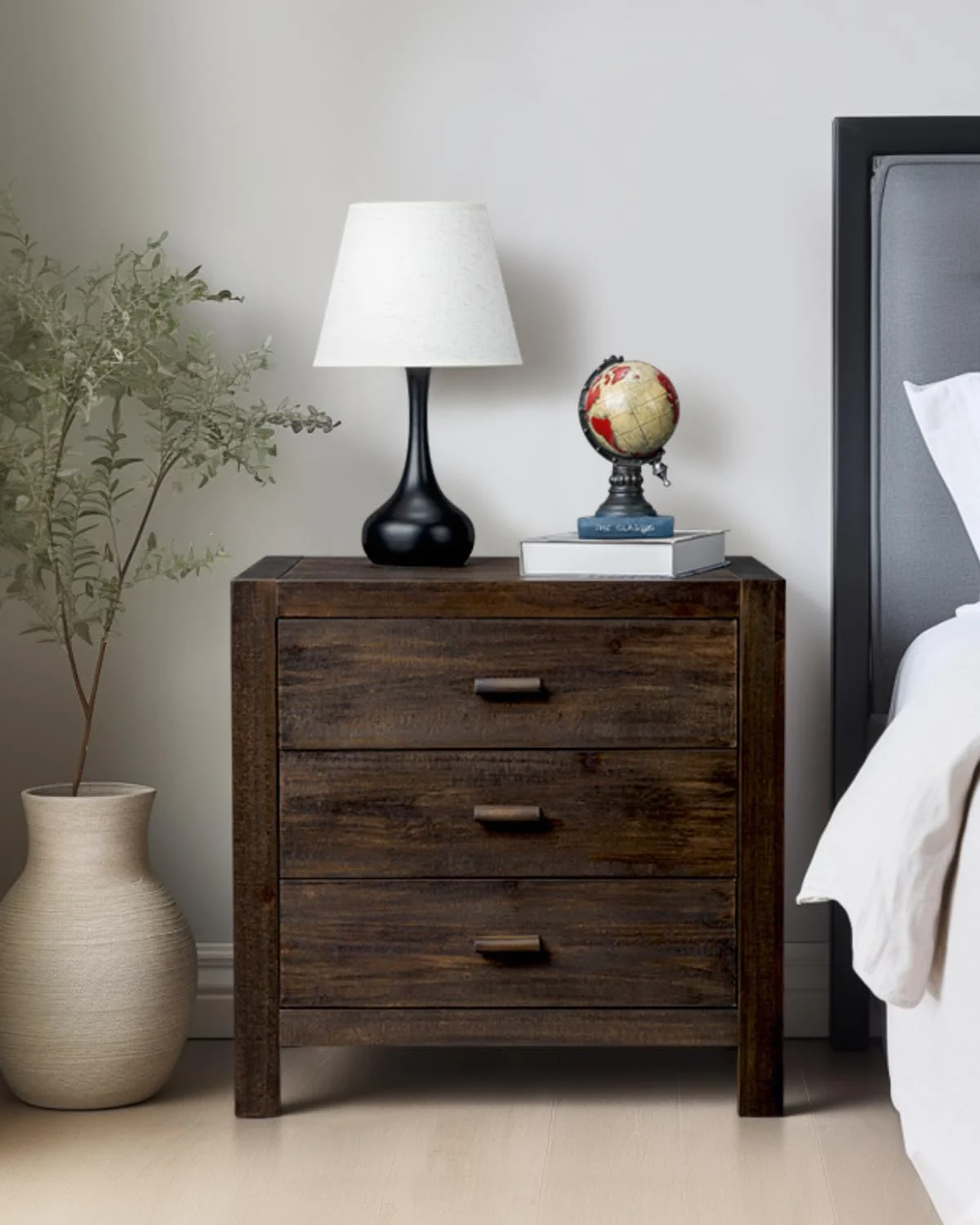 Karl Home Farmhouse Nightstand with Charging Station in Brown in a room