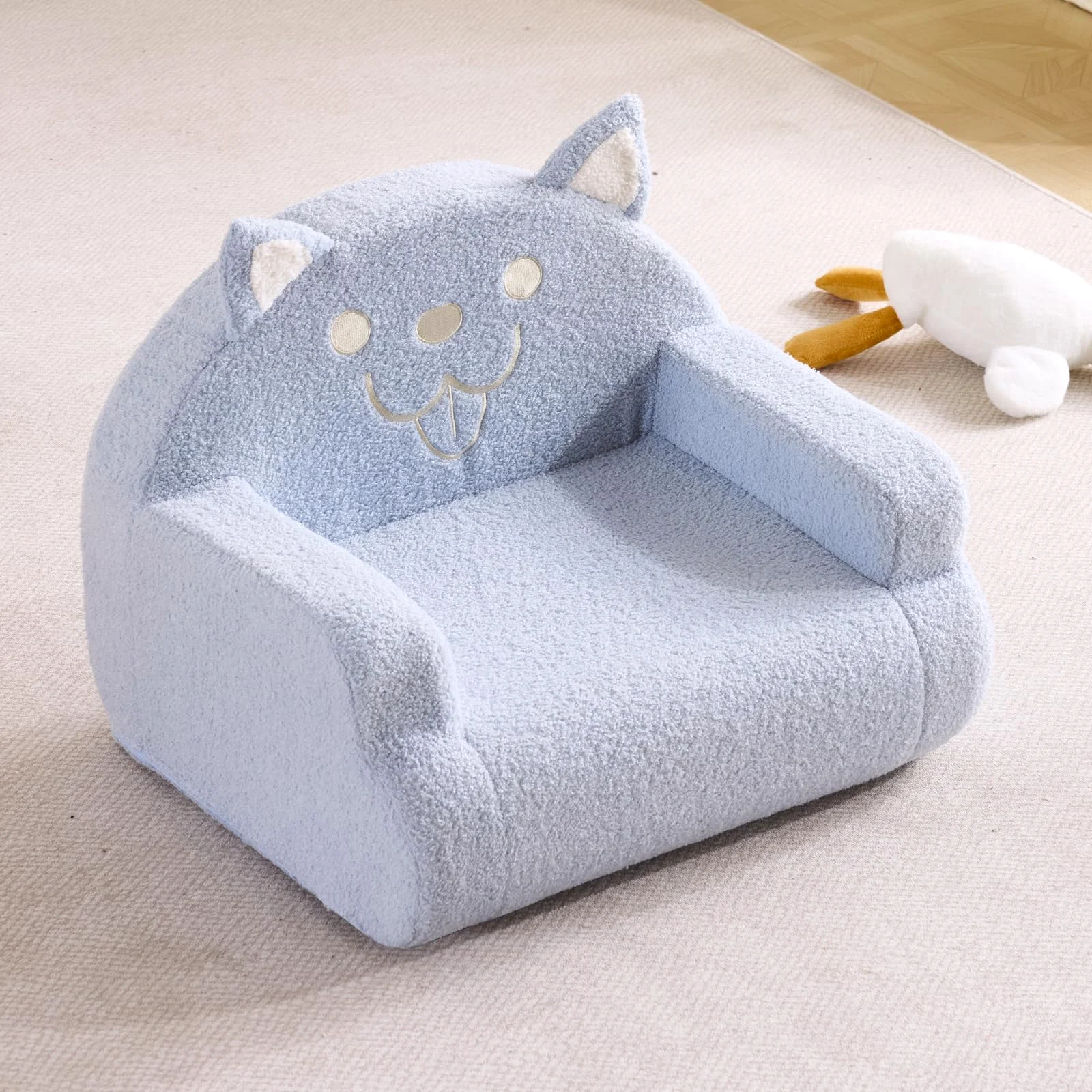 Karl Home Toddler Armchair in a room