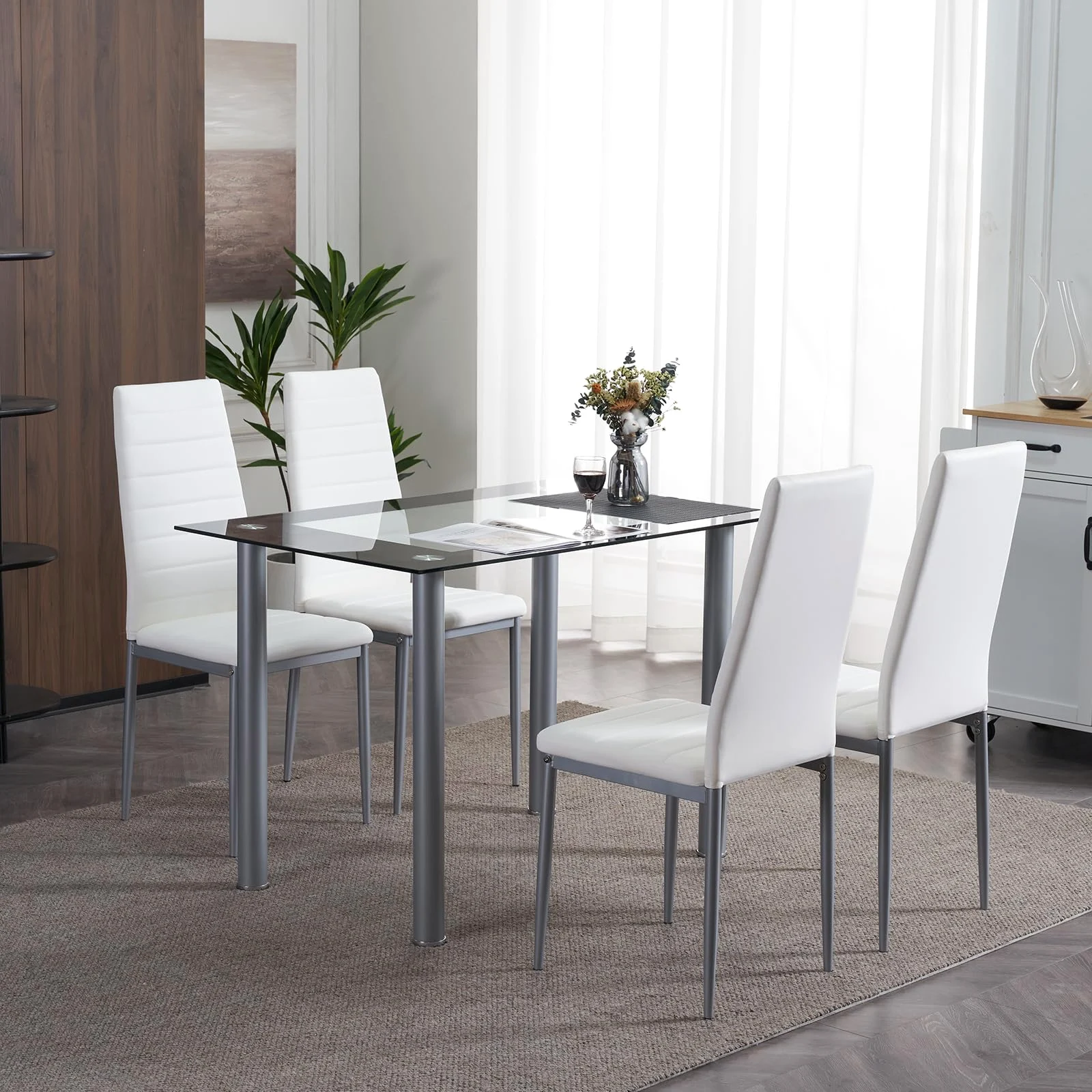 Karl Home Five-Piece Dining Set with Leather Chairs in a room